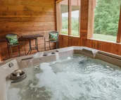 A treasured favorite, Loretta's Cabin is situated on 11 scenic acres
