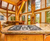 Cabin w/ private hot tub, gourmet kitchen, handcrafted wood details, near skiing