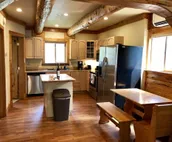 Log cabin with fireplace, minutes from skiing, snowmobiling, xc ski, and more!