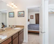 Modern riverfront condo with hot tub, entertainment & river views