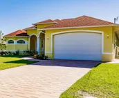Scenic water view. 2 master suites with direct pool access. Villa Casa Amarilla