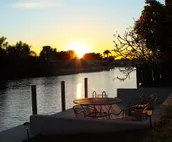 Scenic water view. 2 master suites with direct pool access. Villa Casa Amarilla