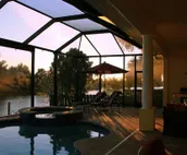 Scenic water view. 2 master suites with direct pool access. Villa Casa Amarilla
