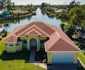 Scenic water view. 2 master suites with direct pool access. Villa Casa Amarilla