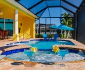 Scenic water view. 2 master suites with direct pool access. Villa Casa Amarilla