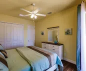 Scenic water view. 2 master suites with direct pool access. Villa Casa Amarilla