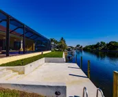 Scenic water view. 2 master suites with direct pool access. Villa Casa Amarilla