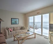 Lakefront De Tour Village Home w/ Deck & Fire Pit!