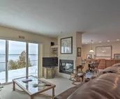 Lakefront De Tour Village Home w/ Deck & Fire Pit!