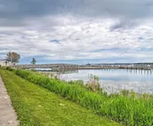 Lakefront De Tour Village Home w/ Deck & Fire Pit!