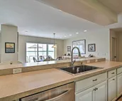 Lakefront De Tour Village Home w/ Deck & Fire Pit!
