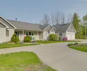 Lakefront De Tour Village Home w/ Deck & Fire Pit!