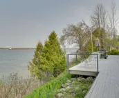 Lakefront De Tour Village Home w/ Deck & Fire Pit!