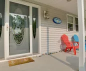 Lakefront De Tour Village Home w/ Deck & Fire Pit!