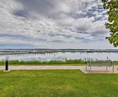 Lakefront De Tour Village Home w/ Deck & Fire Pit!