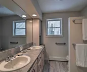Lakefront De Tour Village Home w/ Deck & Fire Pit!