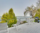 Lakefront De Tour Village Home w/ Deck & Fire Pit!