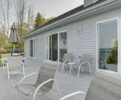 Lakefront De Tour Village Home w/ Deck & Fire Pit!