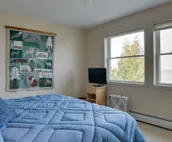 Lakefront De Tour Village Home w/ Deck & Fire Pit!