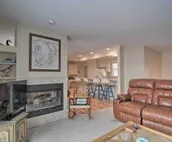 Lakefront De Tour Village Home w/ Deck & Fire Pit!