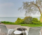 Lakefront De Tour Village Home w/ Deck & Fire Pit!