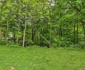 Walkable Lake Elkhart Apt: Dine, Shop, Swim!