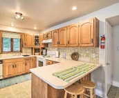 Walkable Lake Elkhart Apt: Dine, Shop, Swim!