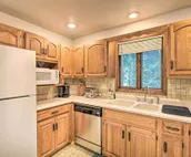 Walkable Lake Elkhart Apt: Dine, Shop, Swim!