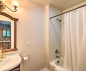 Walkable Lake Elkhart Apt: Dine, Shop, Swim!