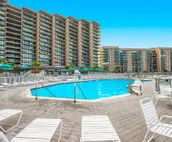Sea Colony Tennis townhouse with private screened porch basketball, pool, & gym