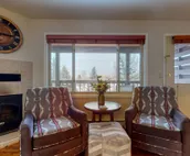 Spacious condo near downtown Jackson with furnished deck, mtn views & grill