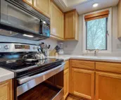 Spacious condo near downtown Jackson with furnished deck, mtn views & grill