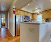 Spacious condo near downtown Jackson with furnished deck, mtn views & grill