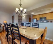 Spacious condo near downtown Jackson with furnished deck, mtn views & grill