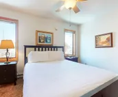 Roomy 2-story home with furnished deck, grill, fireplace, & great location