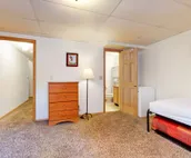 Roomy 2-story home with furnished deck, grill, fireplace, & great location