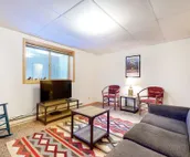 Roomy 2-story home with furnished deck, grill, fireplace, & great location