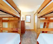 Roomy 2-story home with furnished deck, grill, fireplace, & great location