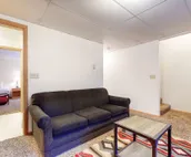Roomy 2-story home with furnished deck, grill, fireplace, & great location