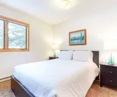 Roomy 2-story home with furnished deck, grill, fireplace, & great location