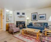 Spacious townhouse with ski & mountain views, deck, grill, & fireplace