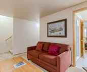 Spacious townhouse with ski & mountain views, deck, grill, & fireplace