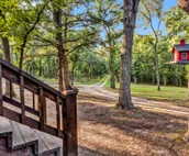 Hidden cabin on private FORTY ACRE woods with 3 bedrooms, near beach and marina!