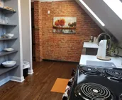 Modern rustic split-level with private balcony