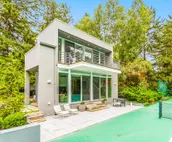Lakefront home with private pool, hot tub, guest house & private beach
