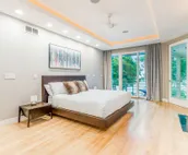 Lakefront home with private pool, hot tub, guest house & private beach