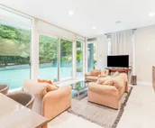 Lakefront home with private pool, hot tub, guest house & private beach