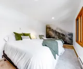 Open and inviting, two-story condo with full kitchen, patio, and wildlife views