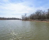 Lakefront property in a peaceful cove on Lake Eufaula. Just steps from the water