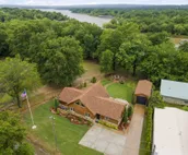 Lakefront property in a peaceful cove on Lake Eufaula. Just steps from the water